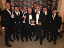 Winning EPS team, with Steve Goodlad COO (holding prize) with Nick Palmer Managing Director (1st left) and the EPS production team based at Fife, Kirkcaldy
